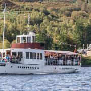 The SS Sir Walter Scott, built at the Denny yard in Dumbarton in 1899, passing Royal Cottage, built for Queen Victoria’s visit to Loch Katrine in 1859 to open the waterworks (Image - Paul Saunders Photography)