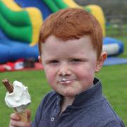 Oliver McCuaigh, 4, from Gartocharn enjoys an ice cream at a Coronation Big Lunch in Gartocharn