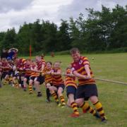 Players put all their effort into the ever-popular tug-of-war