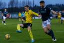 Stevie Farrell praised his Dumbarton players after they ran Dundee close in Saturday’s Scottish Cup fourth round tie - though things might have been very different if Conner Duthie, above, hadn’t had a late penalty shout waved away by ref