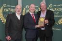Stuart Cordiner and Fred Moore of Cruise Loch Lomond picking up the award from Stephen Cotter, Chief Operating Officer of CIE Tours