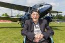 Second World War veteran Arthur Clark’s care home surprised him with a flight in a 1930s plane (Care UK/PA)