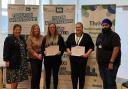Jackie Baillie MSP (far left) and Councillor Gurpreet Singh Johal, West Dunbartonshire Council’s Housing and Communities Convener ( far right) with apprentices from the authority’s housing team