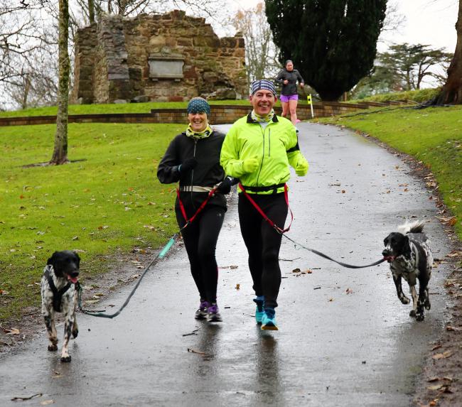 Alison Reid and Zander Beggs, with their dogs