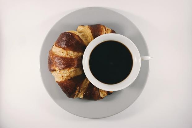 Dumbarton and Vale of Leven Reporter: Coffee with a croissant. Credit: Canva