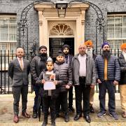 Relatives of Jagtar Singh Johal were joined by West Dunbartonshire MP, Martin Docherty-Hughes outside 10 Downing Street