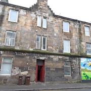 The property on Glasgow Road went under the hammer this afternoon