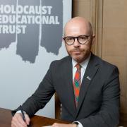 Martin Docherty-Hughes MP signing The Holocaust Educational Trust’s Book of Commitment in the House of Commons