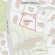 The site in Kirkton Grove where plans to build a garage in the grounds of a house have sparked a furious response from some neighbours