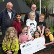 Pupils received a cheque for £50 from Rotarians William Wilkie and Jim Moore of the Rotary Club of Dumbarton