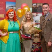 [Left to right]: Host Michelle McManus, winner Courteney Forrester, and Meallmore’s managing director Cillian Hennessey