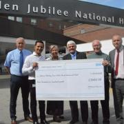 Hugh Galloway, second from right was saved by a team at the NHS Golden Jubilee