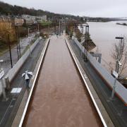 Shocking images show extent of flooding that forced train station to close