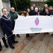 Provost Douglas McAllister led the ceremony on January 27 which took place at Solidarity Plaza, Clydebank
