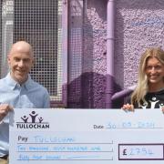 Richie Gallacher, Tullochan chief executive (left) pictured with Gemma Connell (right), who raised £2,754 for the youth charity